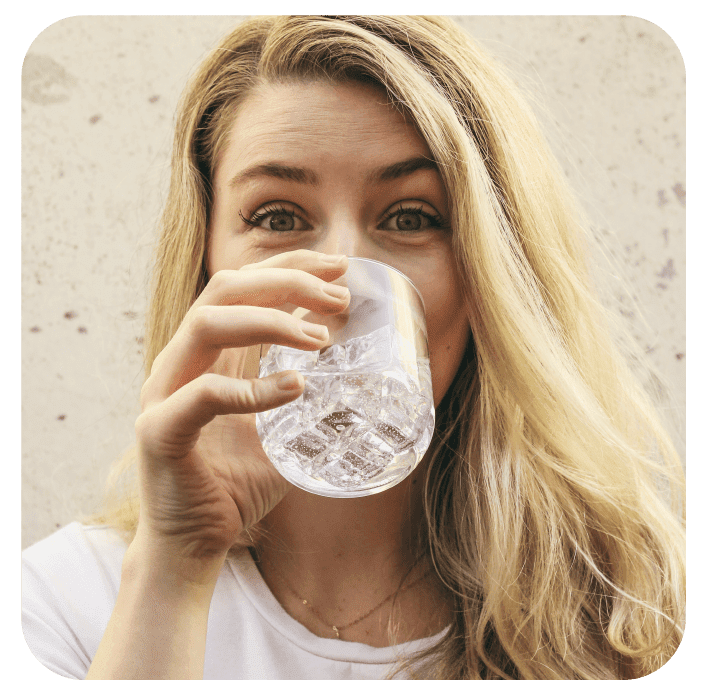 woman drinking fresh water